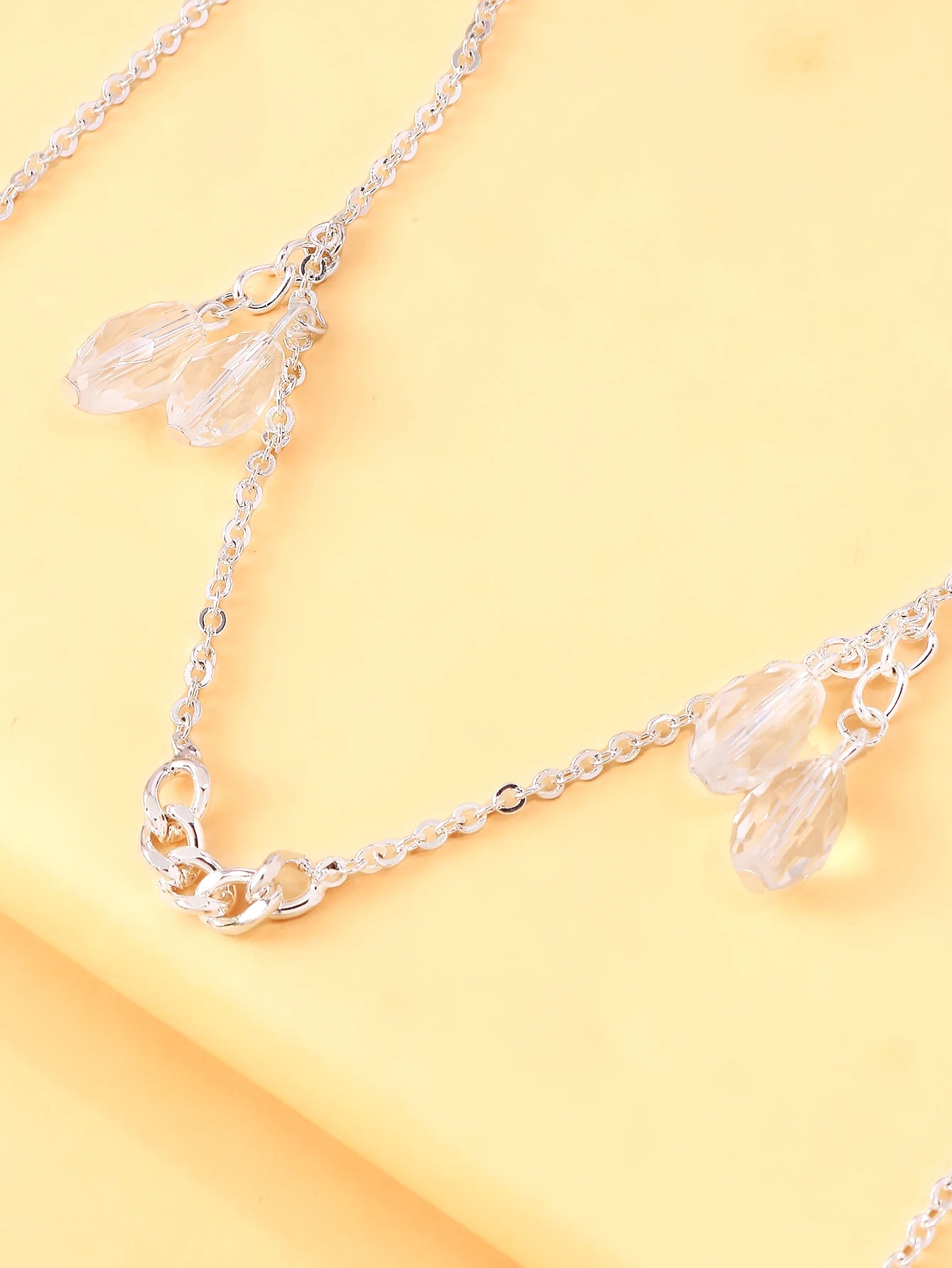 A crystal pendant face chain, a fashionable and natural-style stage accessory for women, trendy and unique jewelry. TAVEN System LLC