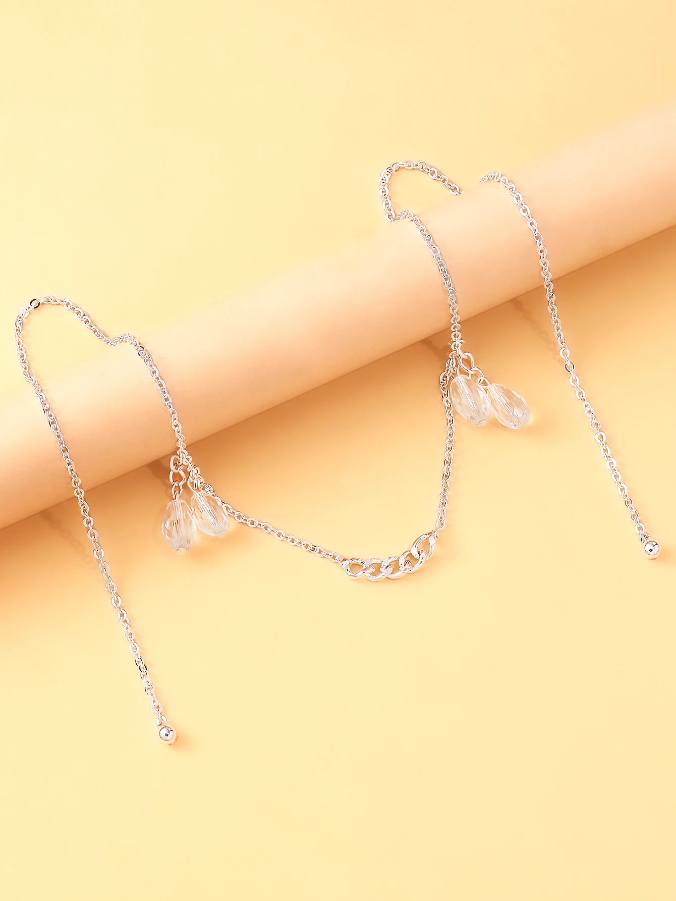 A crystal pendant face chain, a fashionable and natural-style stage accessory for women, trendy and unique jewelry. TAVEN System LLC